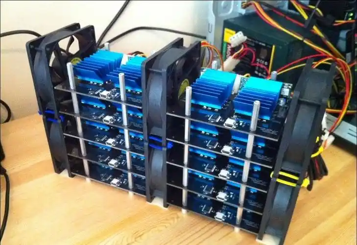 A close up of a mining rig with multiple GPUs